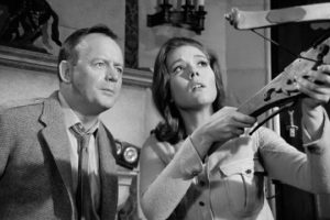 Emma Peel (The Avengers) casually destroying other peoples property with medieval weaponry